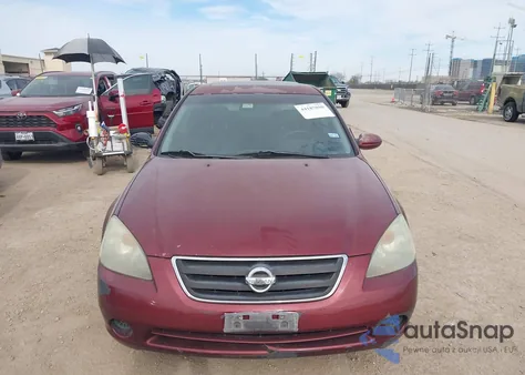 2002 Nissan Altima 2.5 Sl z USA, uszkodzony, nr VIN 1N4AL11E92C231370